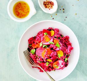 Back to the roots bowl with baby beetroot, millet and chilli herb dressing.