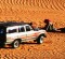 Over the edge ... trucks filled with travellers having their African adventures together can be fun.