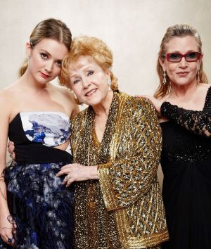 Billie Lourd with her mother Carrie Fisher and grandmother Debbie Reynolds at the Screen Actors Guild Awards in 2015.