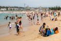 People try to beat the heat on Bondi Beach on Tuesday.