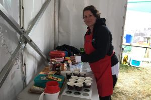 Salvation Army volunteer Kylie Smith making free coffee for people at Falls on Saturday.