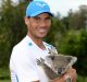 Mandatory shot: Rafael Nadal poses with a Koala before the Brisbane International.