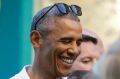 US President Barack Obama greets people in Kailua, Hawaii, on Saturday.