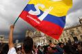 A supporter of the peace deal signed between the Colombian government and rebels of the Revolutionary Armed Forces of ...