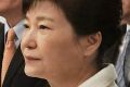 Impeached South Korean President Park Geun-hye, centre, with a selected group of reporters at the presidential house in ...