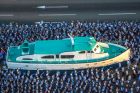 A replica of the Granma yacht is surrounded by students during a military parade in honour of late Cuban leader Fidel ...