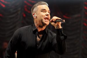 Robbie Williams, reluctant hand-holder.