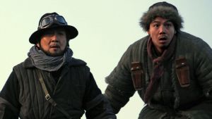 Jackie Chan (left) and Alan Ng in the new action comedy <i>Railroad Tigers</I>.