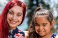 Latoya Terry with her daughter Saraya, who was able to access treatment for her hearing loss through the HEALS program. 