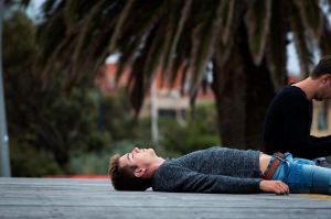  Partygoers sleep on St Kilda beach as the post NYE clean up begins on January 1.