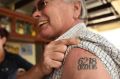 Mike Brown's new tattoo - Yarloop's postcode and the date the historic town burnt down. 