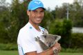 Mandatory shot: Rafael Nadal poses with a Koala before the Brisbane International.