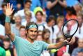 Roger Federer celebrates his win on Monday.