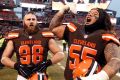 Cleveland's Danny Shelton (right) and Jamie Meder celebrate their win.