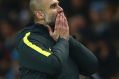 Manchester City manager Pep Guardiola celebrates at the final whistle during the English Premier League soccer match ...