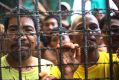 Filipino inmates remain in their cell at the North Cotabato District Jail in Kidapawan city.