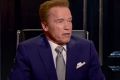 'I'm the boss': Arnold Schwarzenegger takes Donald Trump's chair.