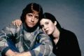 Mark Hamill and Carrie Fisher on the set of Star Wars.