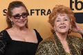 Carrie Fisher, left, and Debbie Reynolds at the 21st Annual Screen Actors Guild Awards in 2015.