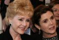 Carrie Fisher (left) and her mother Debbie Reynolds will be buried together at Forest Lawn cemetery in Hollywood Hills. 