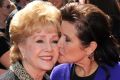 Debbie Reynolds and Carrie Fisher in 2011. 