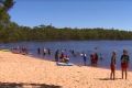 The lake was packed with people enjoying the public holiday. 