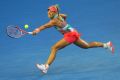 Angelique Kerber plays a backhand in her Women's Singles Final match against Serena Williams.