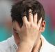 SYDNEY, AUSTRALIA - JANUARY 05: Matt Renshaw watches on as Steve Smith of Australia adjusts his helmet after Renshaw was ...