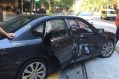 Car versus tram on Collins Street.