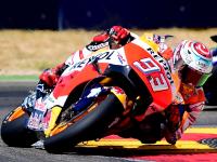 Repsol Honda Team's Spanish rider Marc Marquez (L)