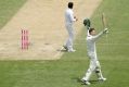 Great knock: Peter Handscomb salutes the crowd after reaching his century.