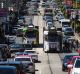 Even in the middle of summer Burke Road, seen here near Camberwell Junction, is choked by cars and trams. 