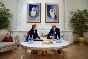 U.S. Secretary of State John Kerry chats with U.S. Ambassador to the United Arab Emirates Barbara Leaf on November 15 2016