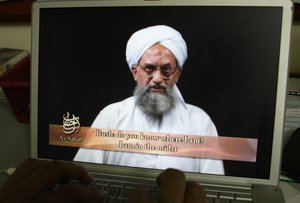 File - Shown on a computer screen is a frame grab from a DVD prepared by Al-Sahab production showing al-Qaida's No. 2 leader Ayman al-Zawahari delivering his address seen in Islamabad, Pakistan, shown June 20, 2006.