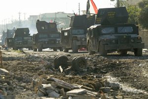 ISOF APC on the streets of Mosul. Northern Iraq, Western Asia. 18 November, 2016.