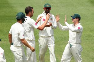 Turn around: Australia captain Steve Smith celebrates catching Yasir Shah of Pakistan off a delivery by Josh Hazlewood ...