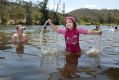 Tristan Viscarra Rossel with daughter Elena Viscarra Rossel cool off at Casuarina Sands.