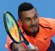 Promise: Nick Kyrgios will play in Monday night's Fast4 exhibition tournament despite struggling with a knee injury.