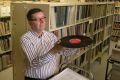 Out of the vault: Arts collection manager Dermot McCaul in the State Library of Victoria basement where part of its vast ...