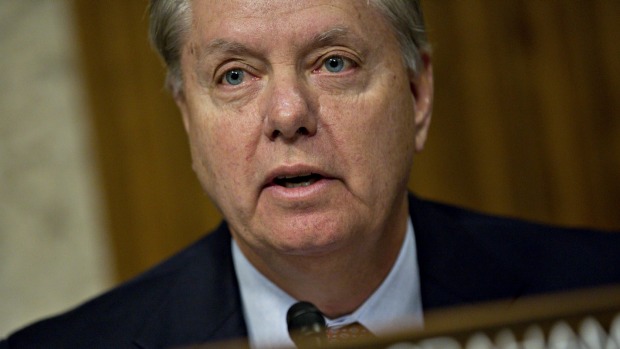 Senator Lindsey Graham questions witnesses during a Senate Armed Services Committee hearing on foreign cyber threats to ...