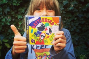 The Kid holding a copy of Battlebird's latest album, Life Is Good.