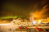 Under the northern lights, Norwegian rookie Thomas Waerner prepares to leave Huslia, Alaska, for Koyukuk on March 14, ...