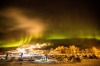 Under the northern lights, Ray Redington Jr arrives in Huslia, Alaska, on March 14, 2015, in the Iditarod Trail Sled Dog ...