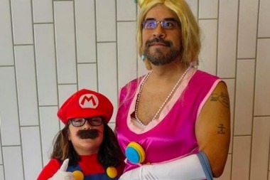 John and his daughter dressed as Mario and Peach.