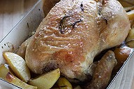 Simple roast chicken with potatoes.