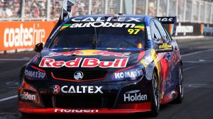 Shane Van Gisbergen crosses the finish line to win the Supercars Drivers Championship for the Sydney 500 on December 4, 2016.