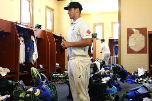 Under-employed: Hilton Cartwright in the change rooms after Australia's victory.