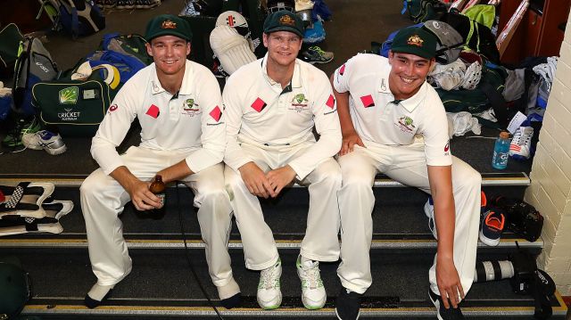 Winners are grinners: Trio Peter Handscomb, Steve Smith and Matt Renshaw inside Australia's dressing room at the SCG ...