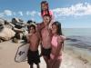 Owen Heasman with his partner's brother Eric Eades, 13, and his daughters Paityn Heasman, 8, and Jesselle Heasman, 12, on the shore near the shark net at Sorrento Beach. The net is attached to the groin at the beach. 4 JANUARY 2017 Picture: Danella Bevis The West Australian