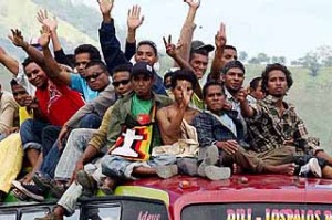 A loaded bus approaches Baucau.